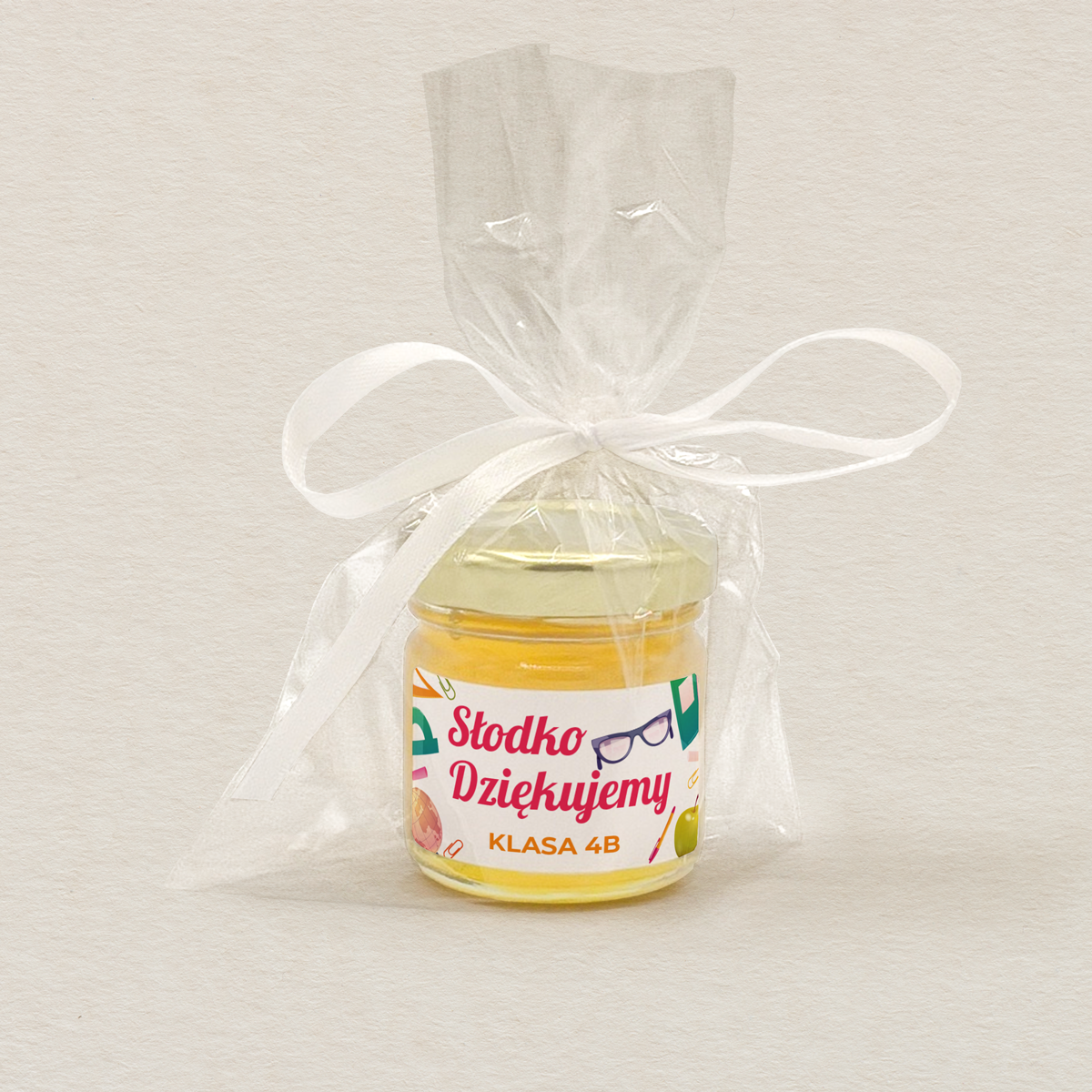 miodek-podziekowanie-dla-nauczyciela-kolorowe-przybory