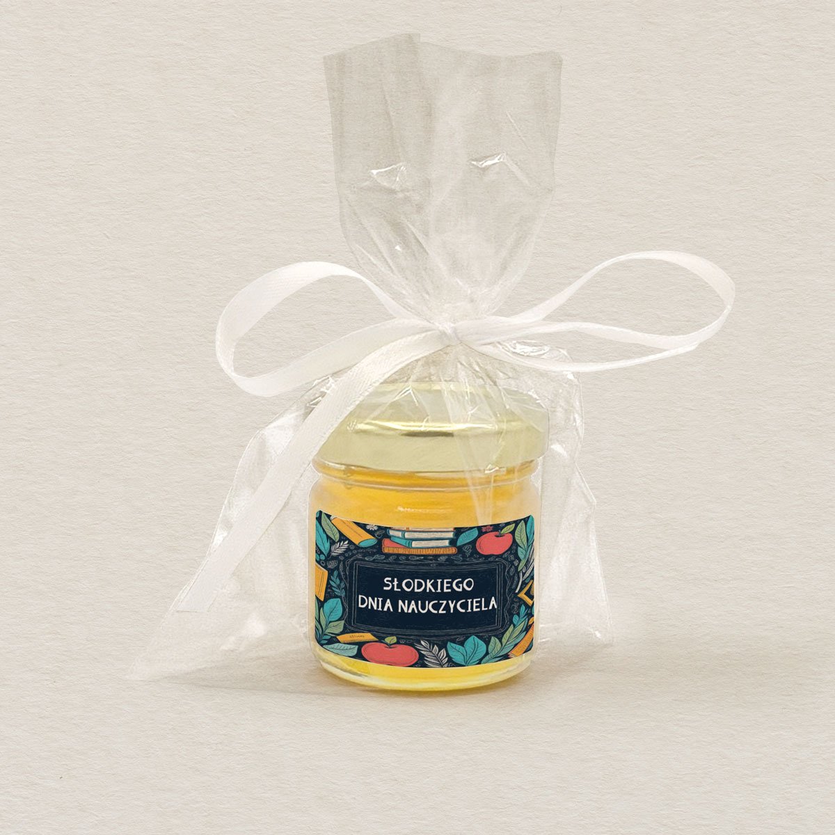 miodek-podziekowanie-dla-nauczyciela-jablko-i-ksiazki