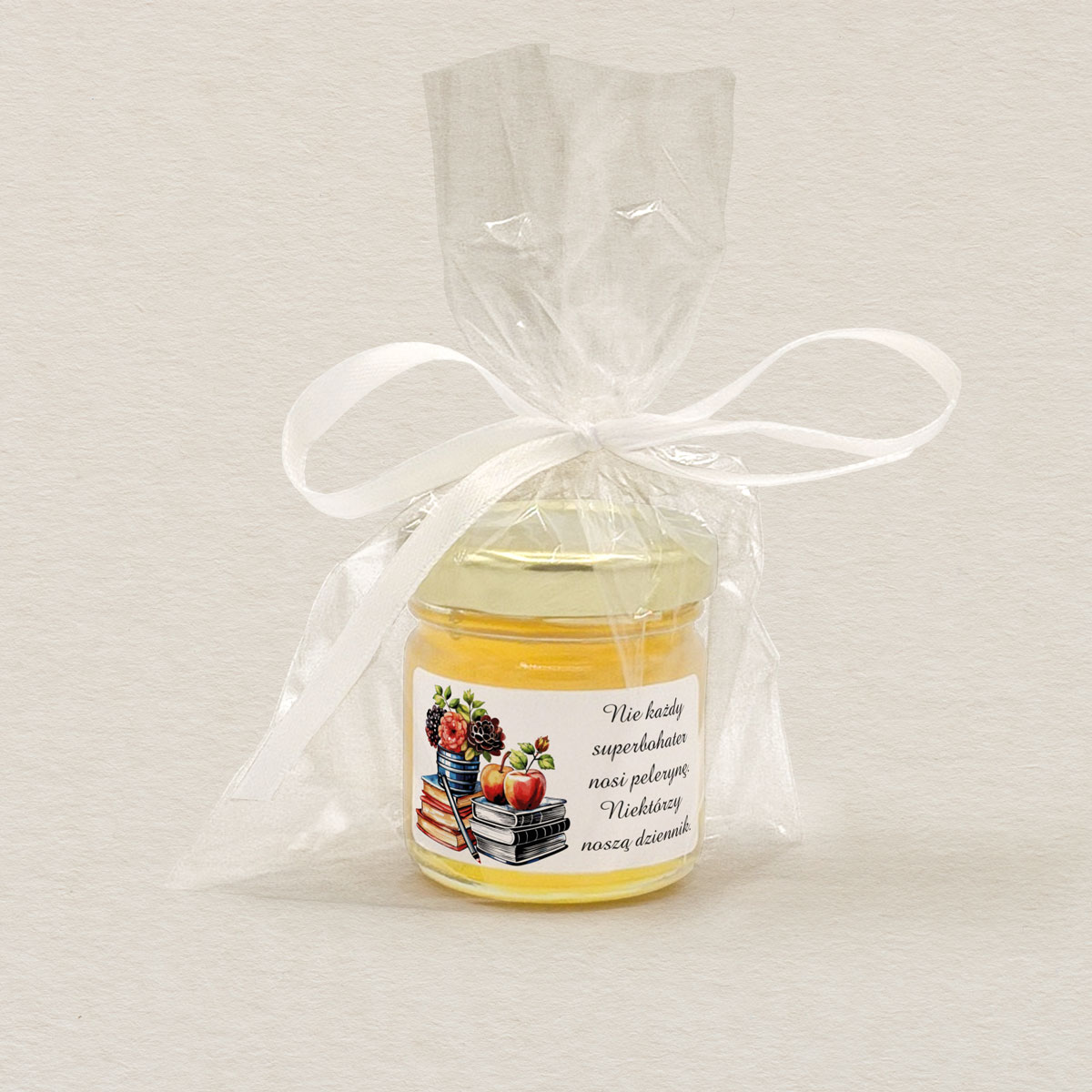 miodek-podziekowanie-dla-nauczyciela-ksiazki-i-jablko