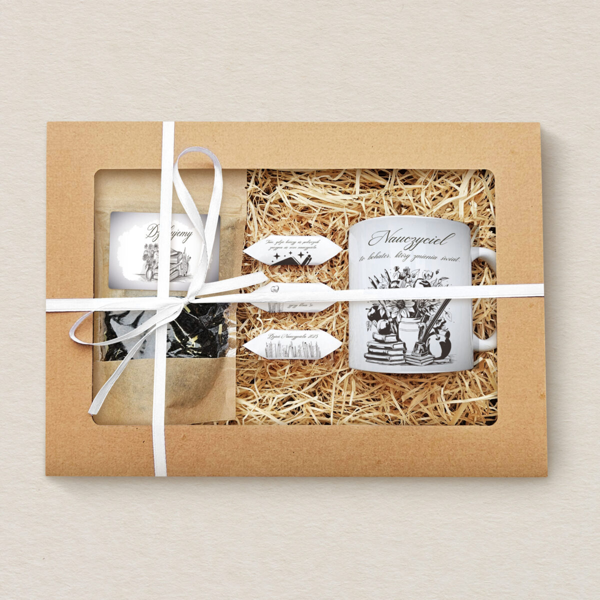 zestaw-prezentowy-dla-nauczyciela-kubek-herbata-i-slodkosci-ksiazki
